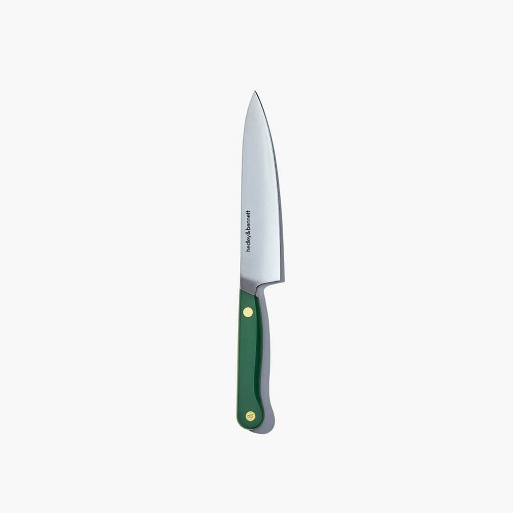 Utility knife with a Shiso Green handle, standing upright