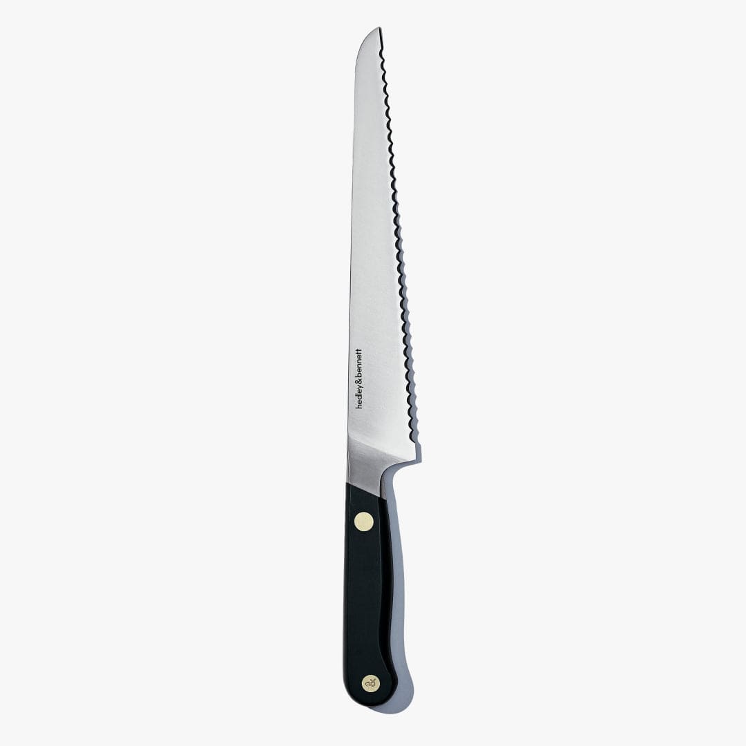 Bread knife with a Caviar Black handle, standing upright