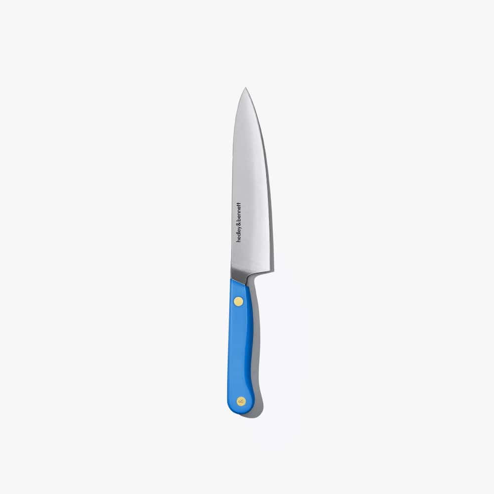 Utility knife with a blue handle, standing upright