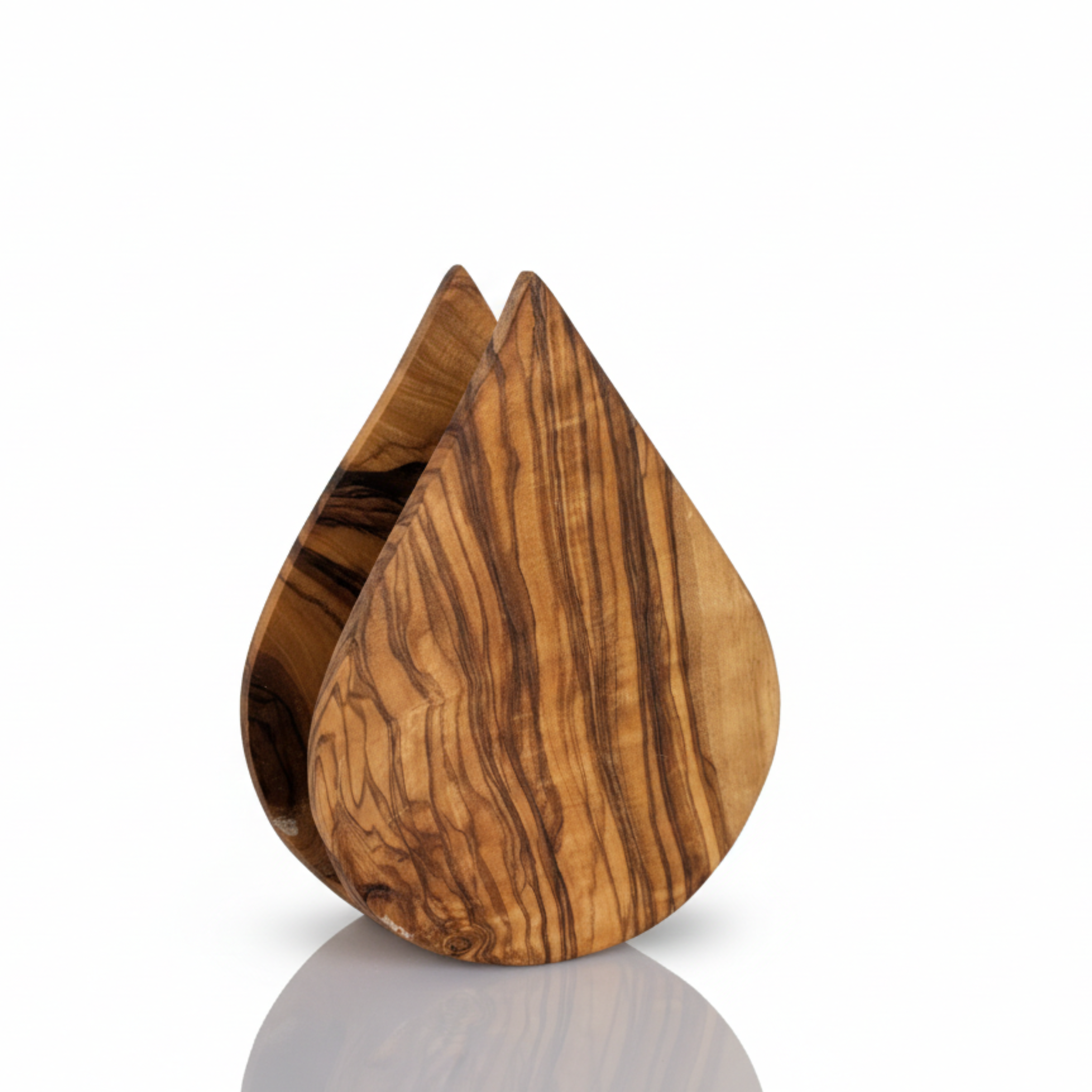 Olive wood napkin holder standing on a white surface with a soft reflection