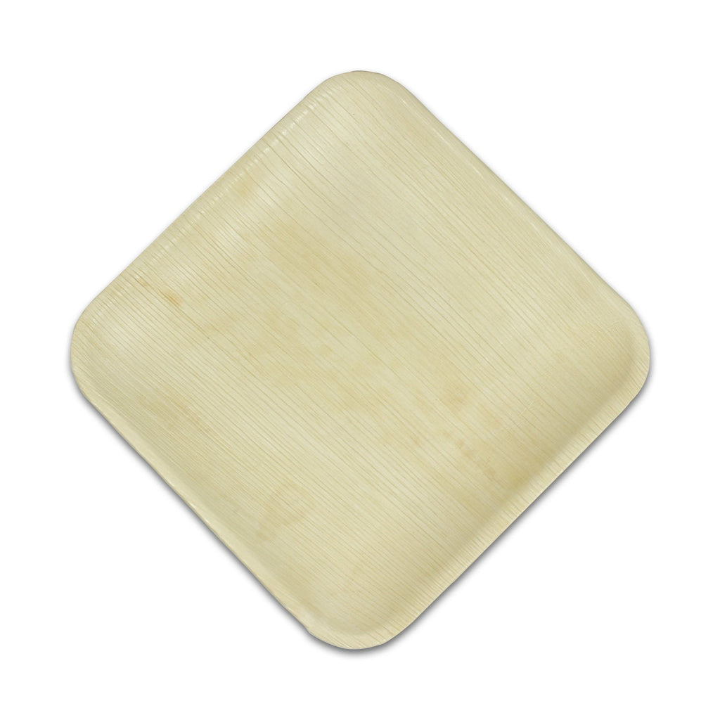 Square palm leaf plate turned on the diagonal, showing its rounded corners