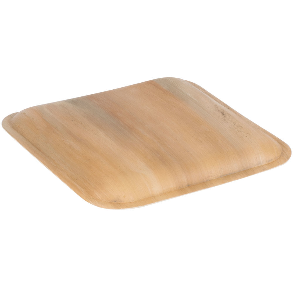 Square palm leaf plate at a low angle, showing its shallow depth
