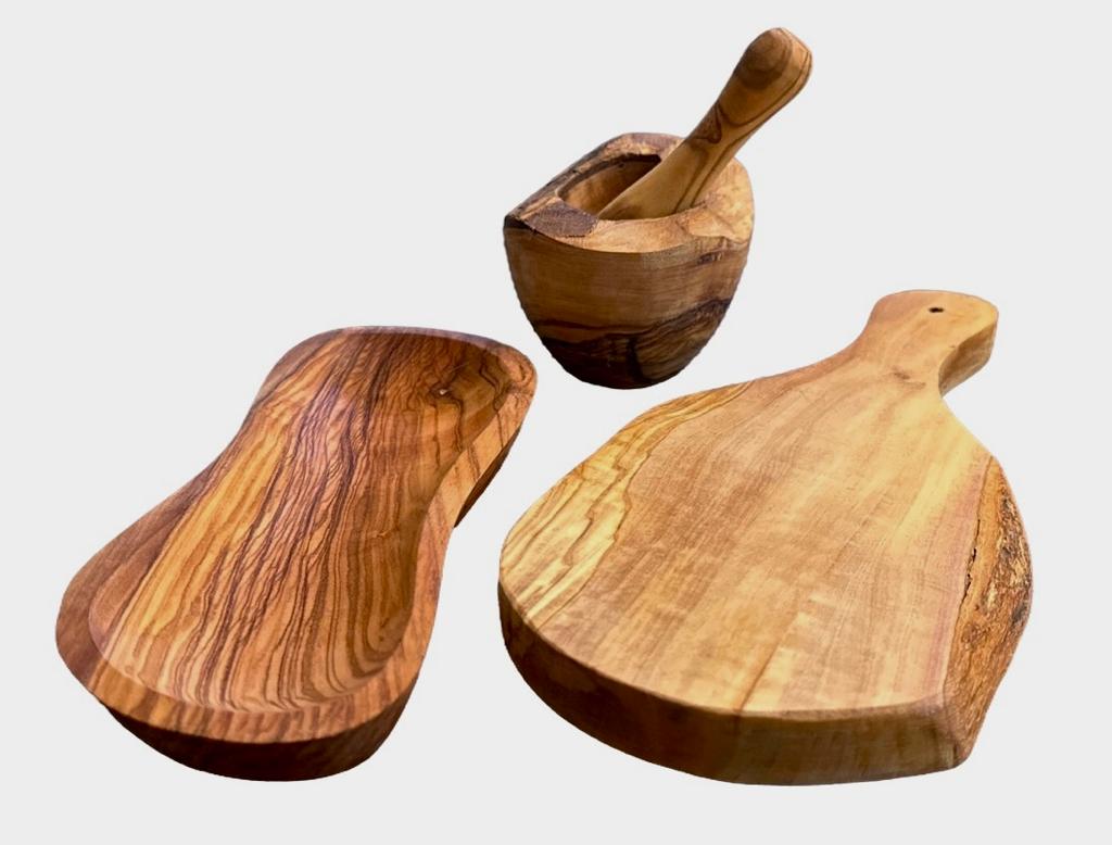 Olive wood mortar and pestle, multi-purpose bowl and cutting board grouped together