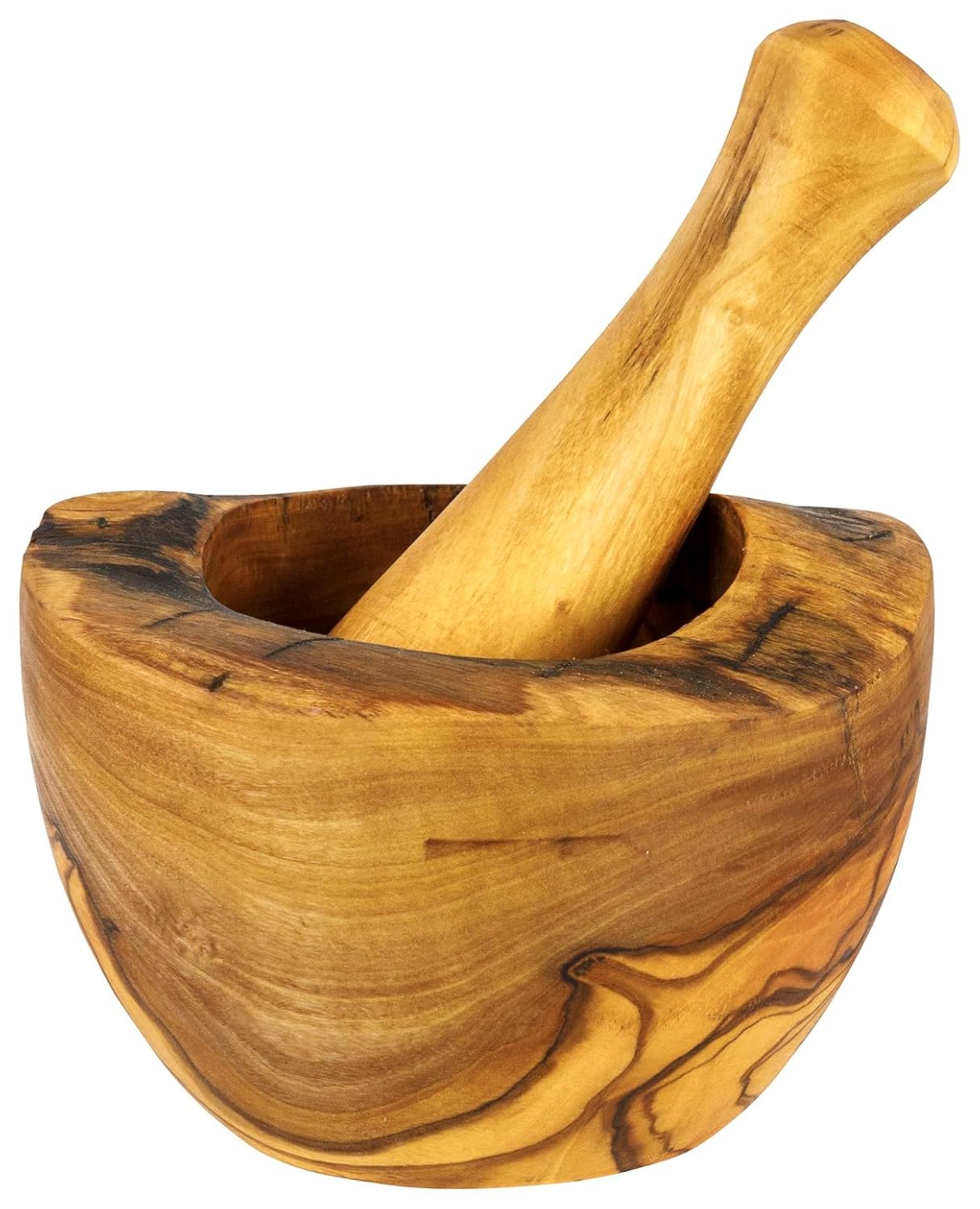 Olive wood mortar with the pestle resting inside, showing the carved bowl