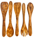 Five olive wood kitchen utensils standing upright in a row